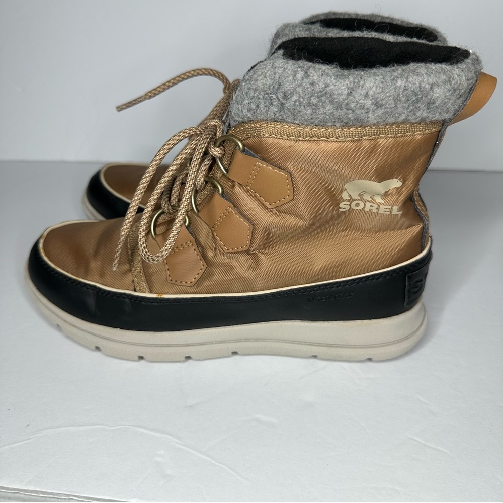 Sorel Tan and Black Winter Boots